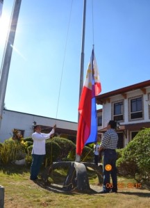 Board Member Joseph R. Ortiz (left) and Provincial Administrator Atty. Alejandro R. Abesamis (right) during the Flag raising